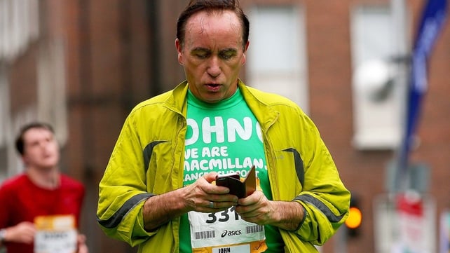 Like - This man brought his mobile phone along for the run
