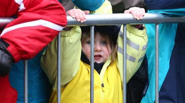 This young spectator was not put off by the drizzle