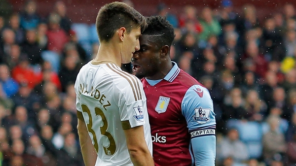 Micah Richards squares up to Swansea's Federico Fernandez