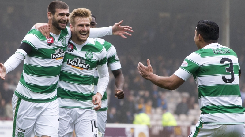 Nadir Ciftci (l) runs to celebrate with Emilio Izaguirre in happier times