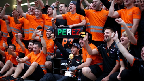 Force India celebrate Sergio Perez's third place finish in the Formula One Grand Prix of Russia in October