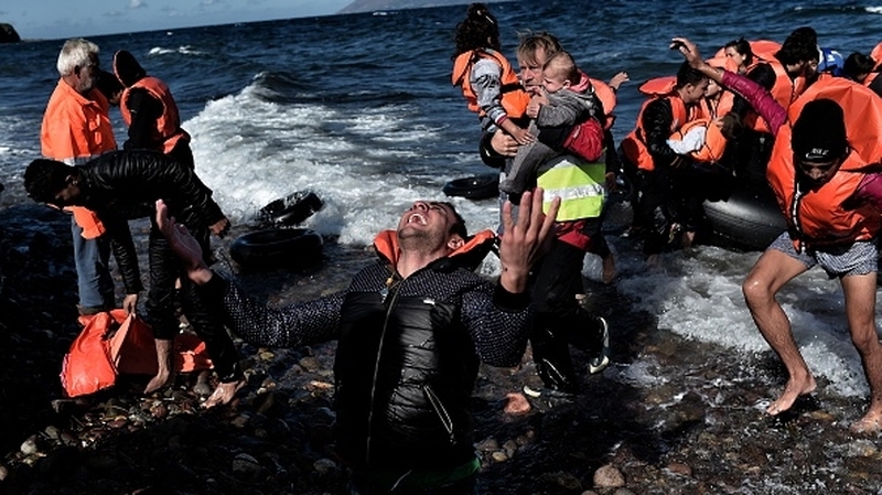 Distressed migrants arrive 
on the Greek island of Lesbos
after crossing the Aegean sea from Turkey