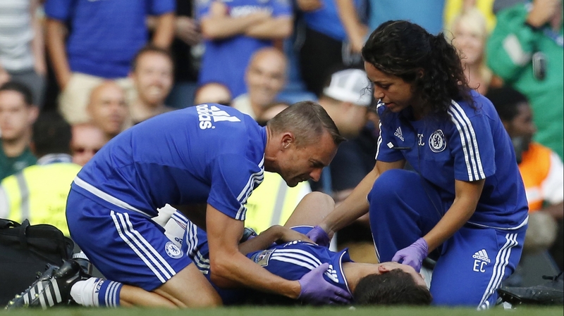 Eva Carneiro and physio Jon Fearn treat Chelsea star Eden Hazard