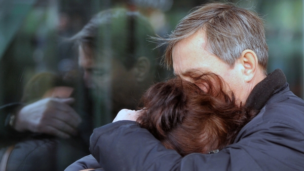 People at Pulkovo international airport outside St Petersburg after news of the crash broke