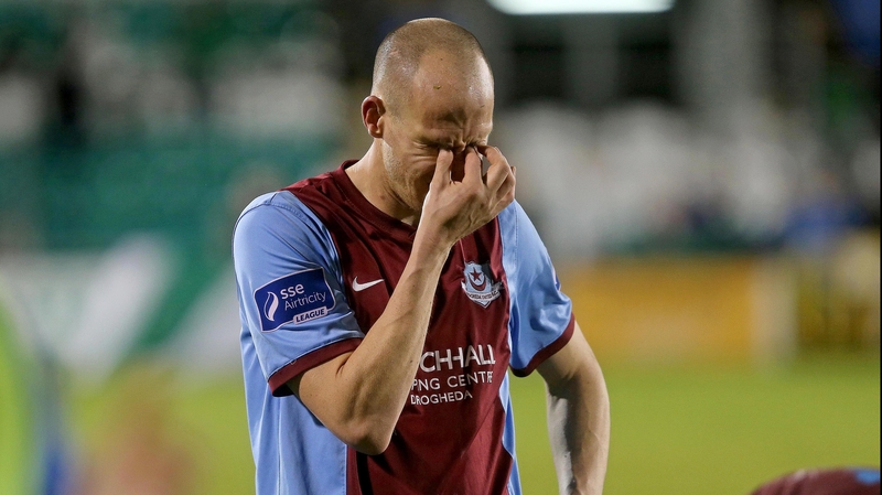 Drogheda's Alan Byrne shows his dejection following Premier League relegation