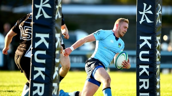 Conall Doherty scores UCD's opening try