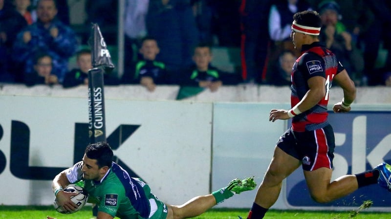 Connacht's Tiernan O’Halloran scores a try against Edinburgh