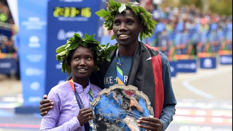 Woman's first-place finisher Mary Keitany from Kenya and Men's winner Stanley Biwott
