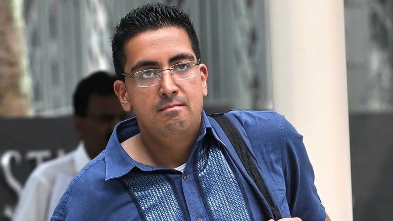 Yogvitam Pravin Dhokia arrives at the state court in Singapore