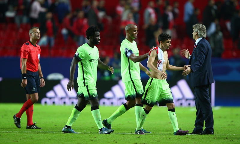 Manuel Pellegrini congratulates his Manchester City charges after their victory at the Ramon Sanchez Pizjuan Stadium