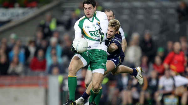 Australia's Paul Duffield puts Bernard Brogan under pressure
