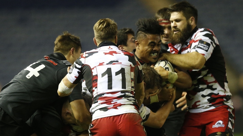 Munster’s Francis Saili takes on Tom Brown and Cornell du Preez of Edinburgh