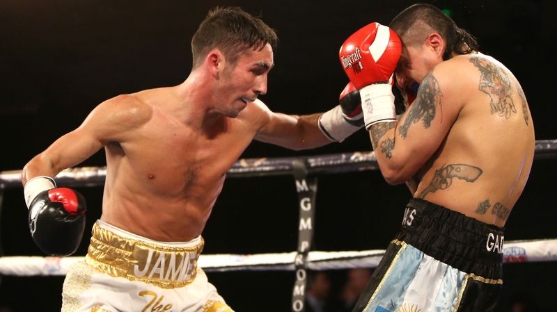 Jamie Conlan (L) lands a punch on Adrian Dimas Garzon