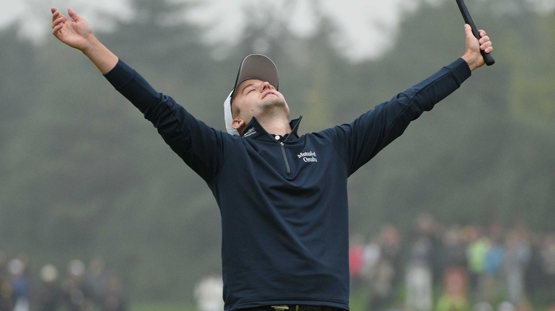 Russell Knox celebrates his victory at the HSBC Champions