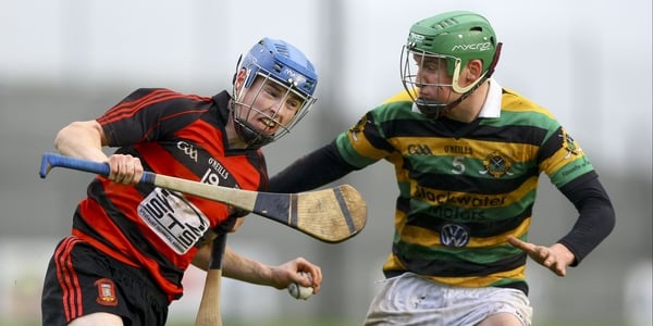 Ballygunner's Tim O'Sullivan with David Dooling of Glen Rovers