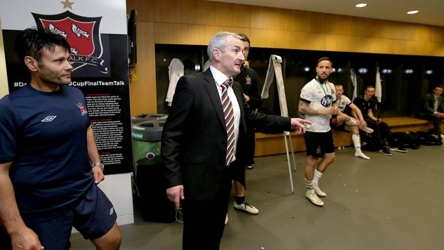 Cork boss Caulfield congratulates the Dundalk players in their dressing room