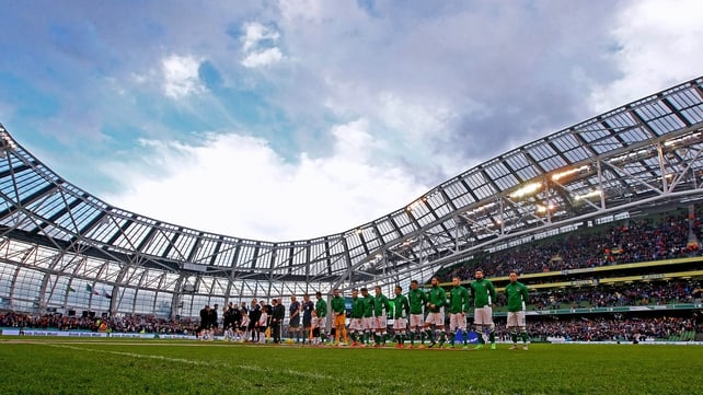 A somewhat wintry sky was the backdrop for the Dundalk and Cork teams as they lined up before the match