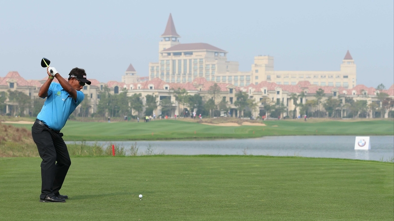 Thongchai Jaidee hits his tee-shot on the ninth hole