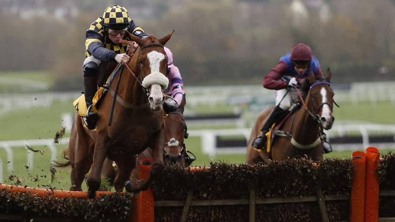 Joshua Moore riding Wolf Of Windlesham clears the last to win The JCB Triumph Hurdle Trial