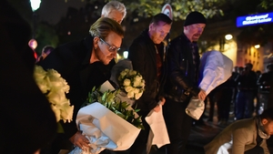 U2 pay their respects near the Bataclan theatre