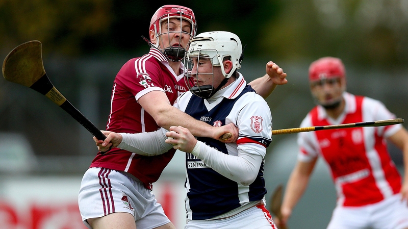 Sean Brennan of Cuala with Ciaran Prendergast of Clara