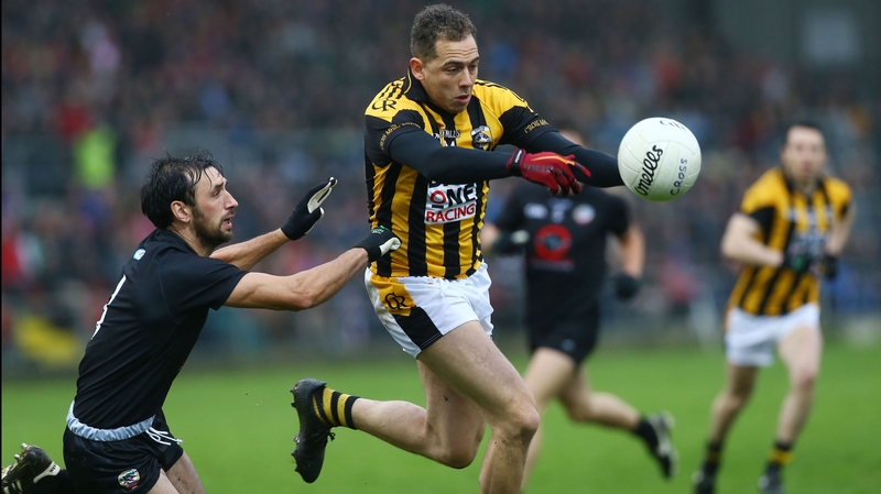 Kilcoo's Aidan Branagan tackles Crossmaglen Rangers' Rico Kelly