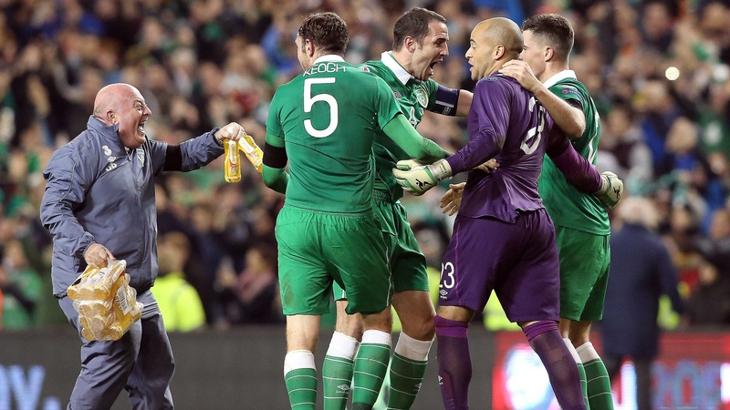 The Ireland defence and kit man Dick Redmond are overjoyed at full-time