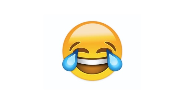 The little picture of a crying, smiling face pipped a host of actual words to the top spot