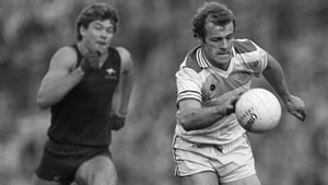 The great Jack O'Shea makes a run up the field