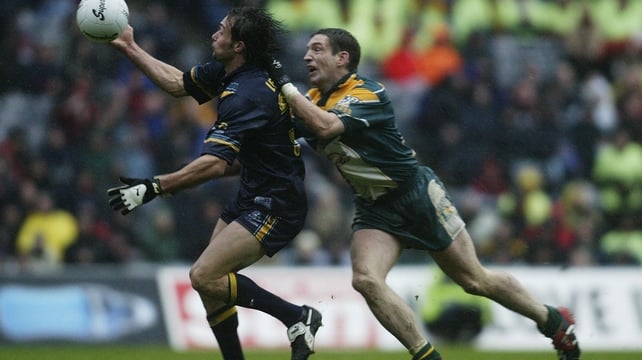 Kieran McGeeney tries to tackle Angelo Lekkas during the 2002 series