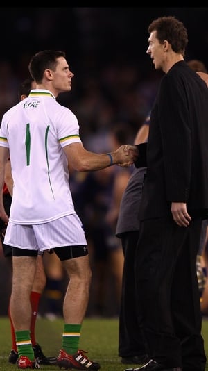 Jim Stynes, who passed away in 2012, shakes hands with Stephen Cluxton in 2011