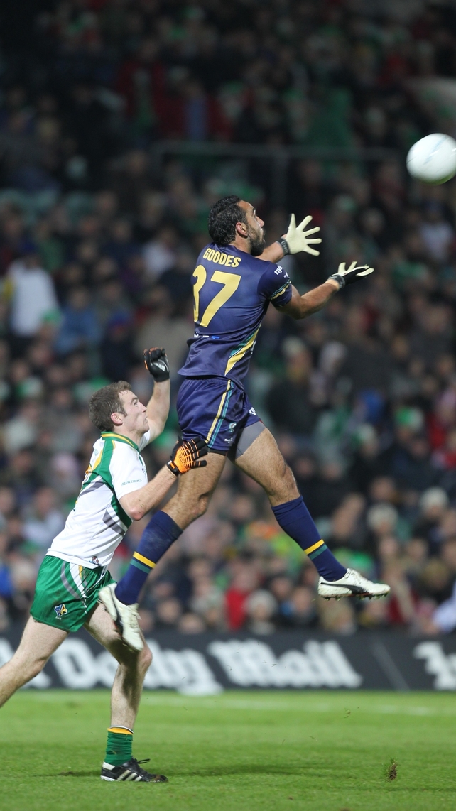 Adam Goodes of Australia and Brendan Donaghy of Ireland contest a high ball in 2010