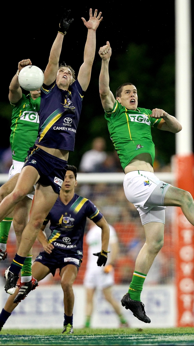 Eoghan Cadogan and Brendan Murphy jump with Trent McKenzie of Australia in 2011