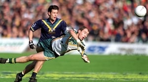Finbar Cullen gets ahead of Blake Caracella of Australia in 2000
