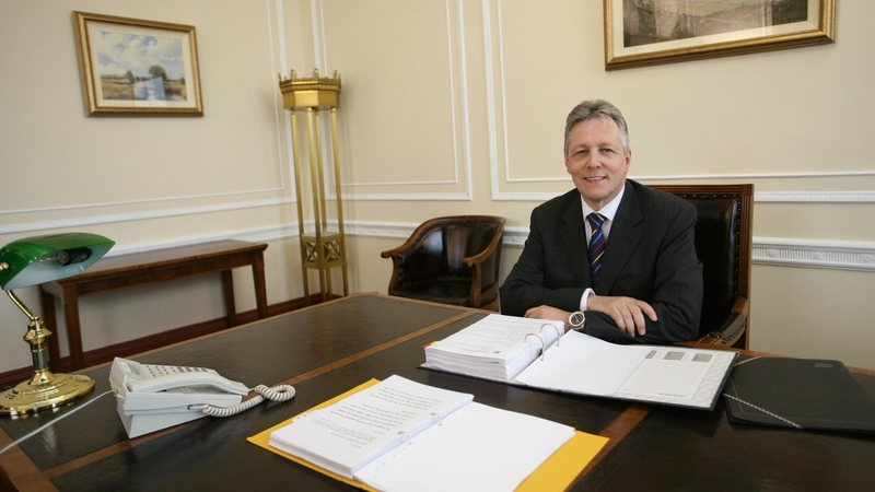Peter Robinson sits at the First Minister's desk for the first time in 2008