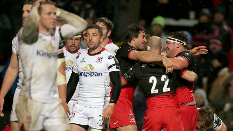 Saracens' players celebrate their last try of the night