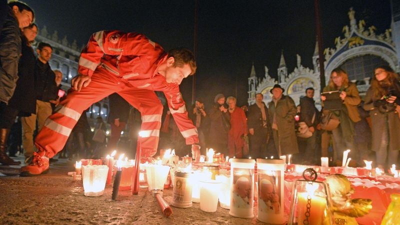 People attended candlelight vigils to remember the Paris attacks in November 2015