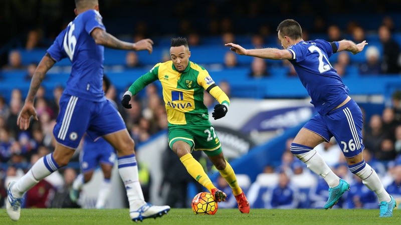 Norwich's Nathan Redmond is challenged by John Terry of Chelsea