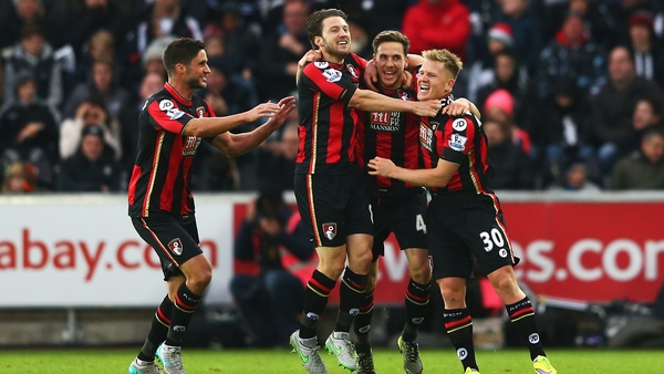 Dan Gosling (second right) celebrates scoring Bournemouth's second goal