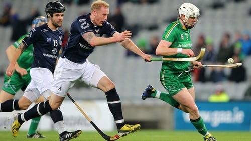 Ireland's Damien Healy is tackled by Conor Cormack of Scotland