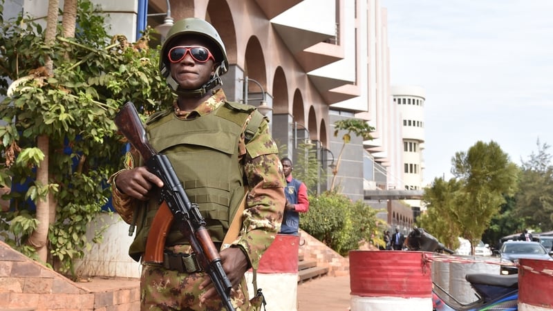 A Malian soldier outside the Radisson Blu hotel in Bamako
