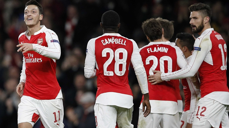 Arsenal's Mesut Ozil (L) celebrates the opener