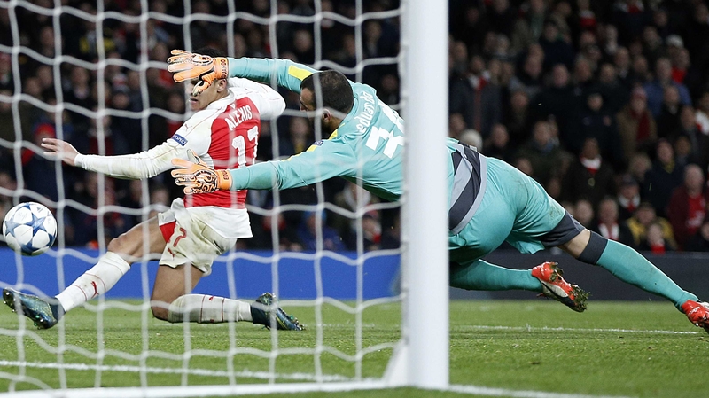 Alexis Sanchez squeezes home Arsenal's third goal against Dinamo Zagreb