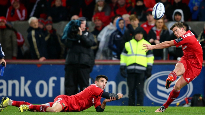 Ian Keatley kicks a conversion with help from Conor Murray