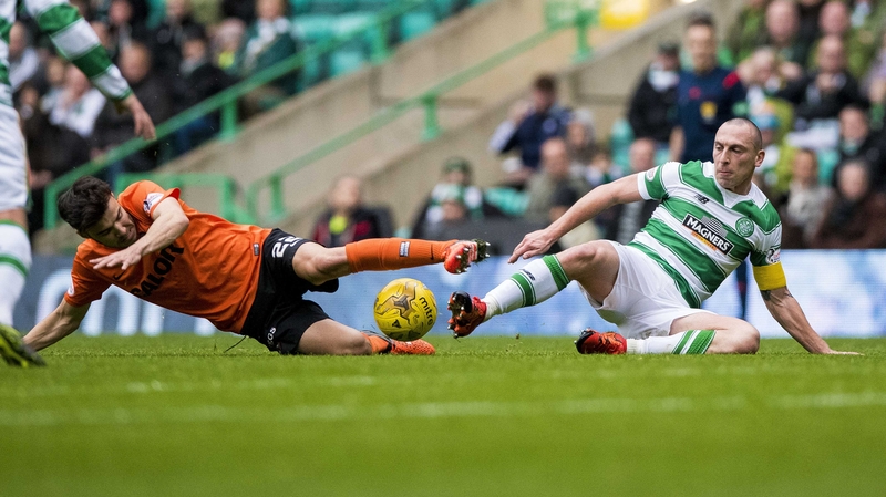 Scott Brown in action action Dundee United