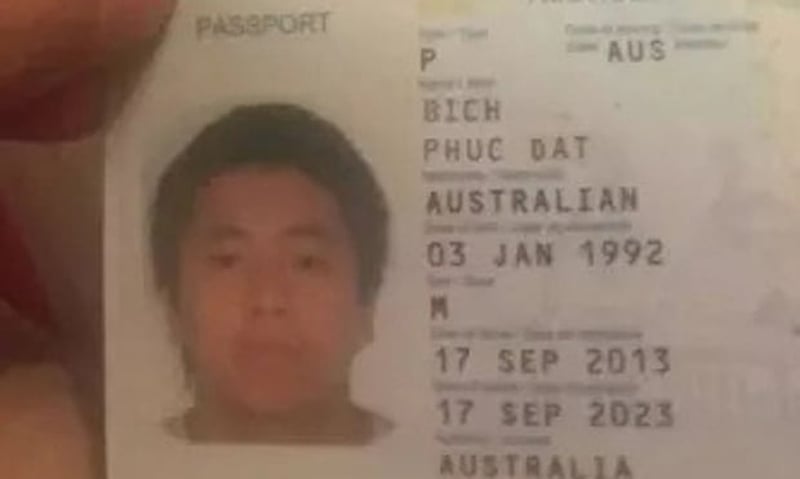 A photo of a passport which showed a man named Phuc Dat Bich