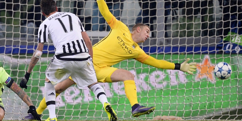 Mario Mandzukic fires Juventus' decisive goal past Joe Hart