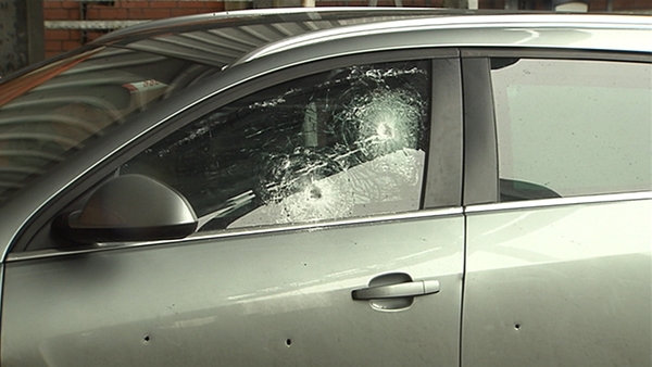The bullet-proof glass and reinforced panelling on the PSNI car protected the two officers sitting inside