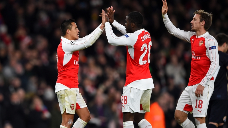 Alexis Sanchez celebrates with Joel Campbell and Nacho Monreal during Tuesday's win over Dinamo Zagreb