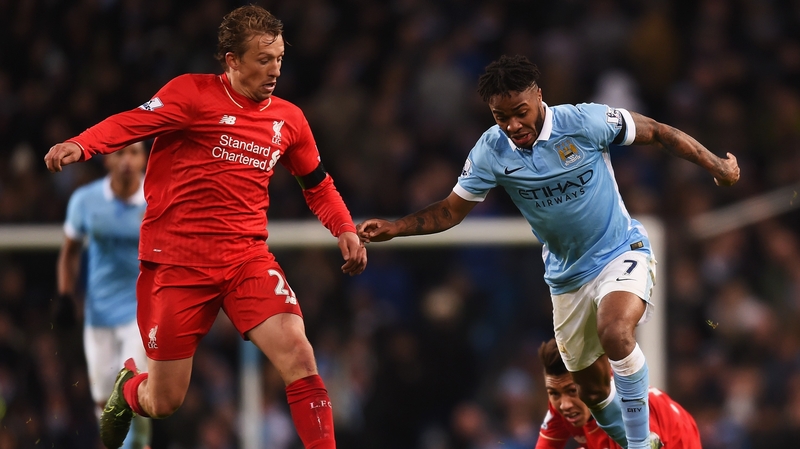Lucas Leiva tackles his former Liverpool team mate Raheem Sterling, now of Manchester City